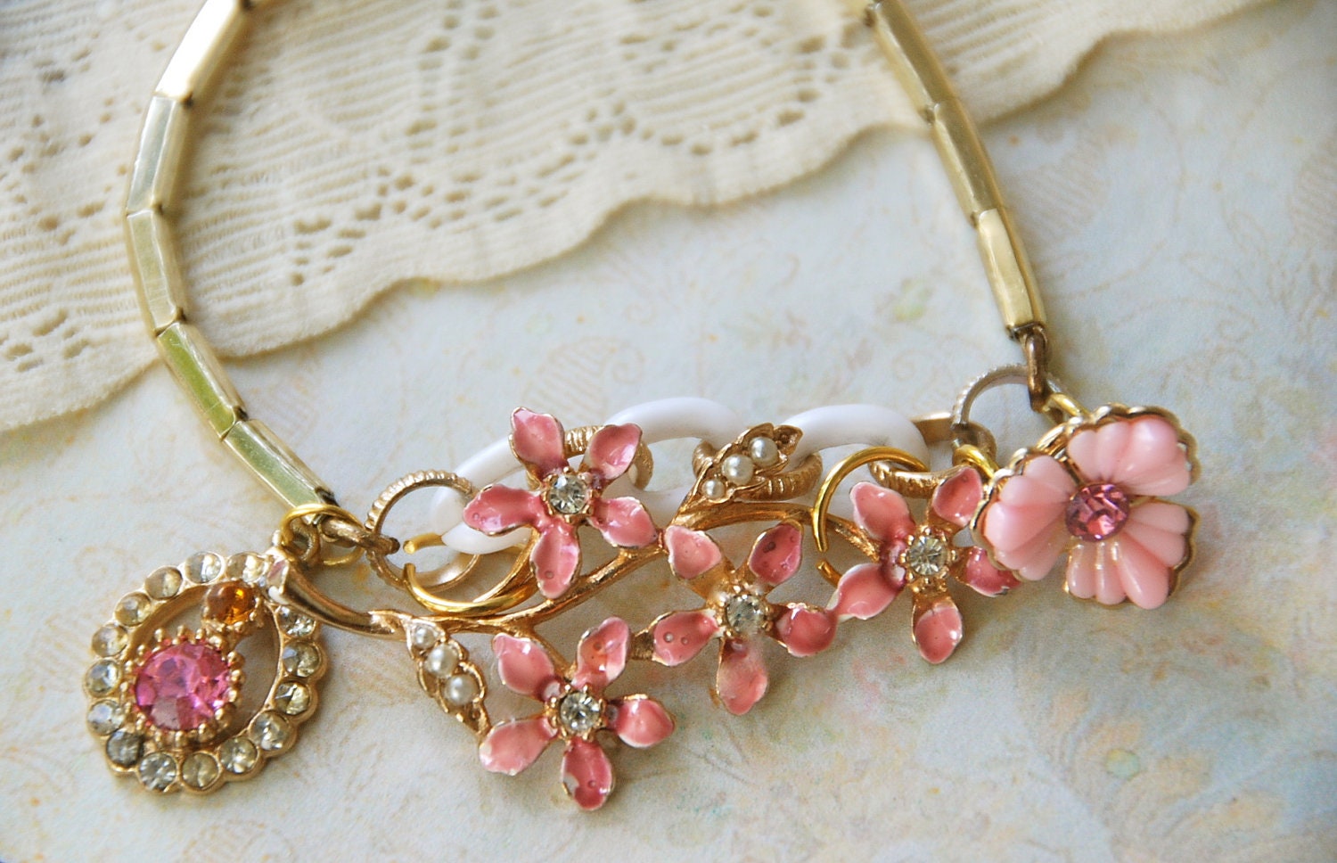 Pink flower passion.vintage assemblage charm bracelet. Tiedupmemories