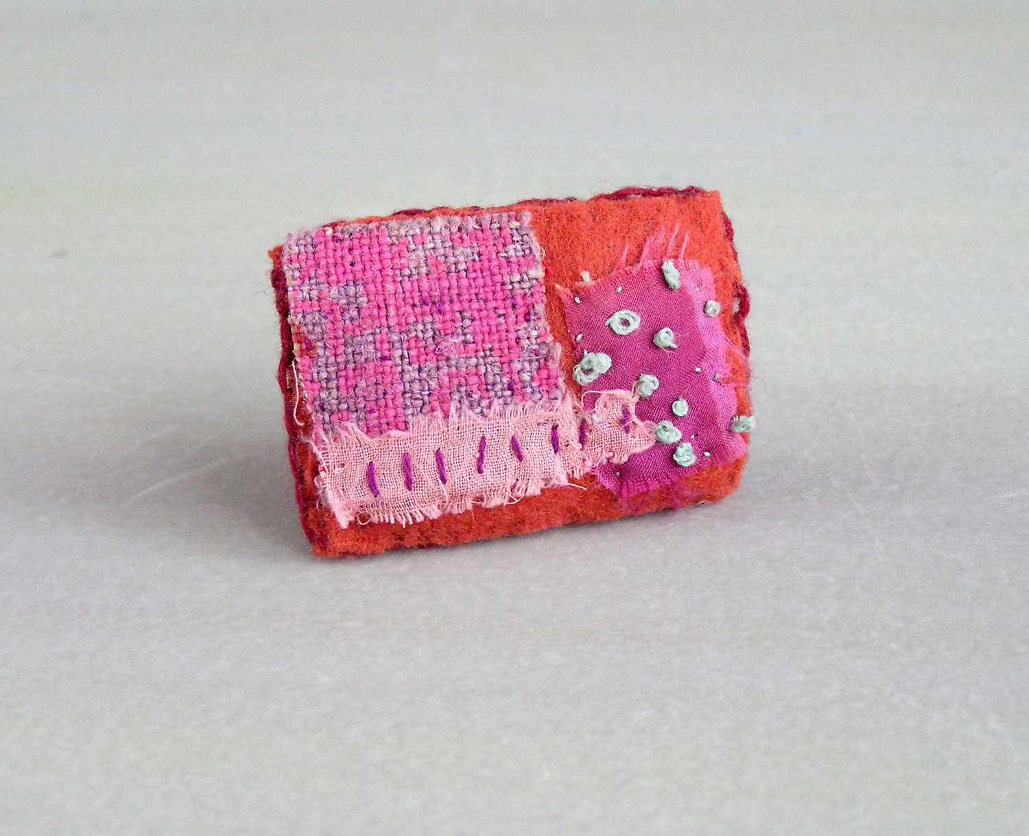 fiber art jewelry  -  textile pin -  applicated pink red textile brooch
