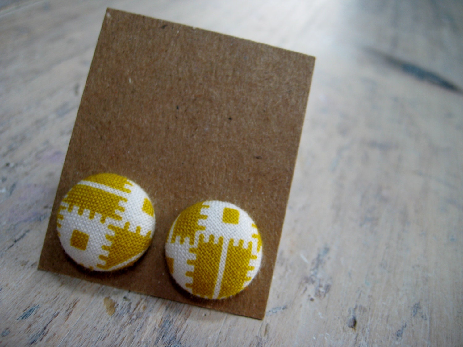 button earrings - amber wheat