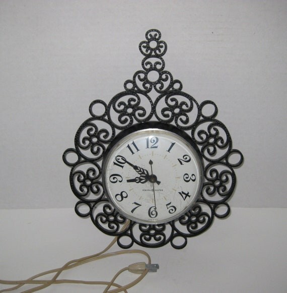 Vintage General Electric Black Filagree Scroll Electric Wall Clock