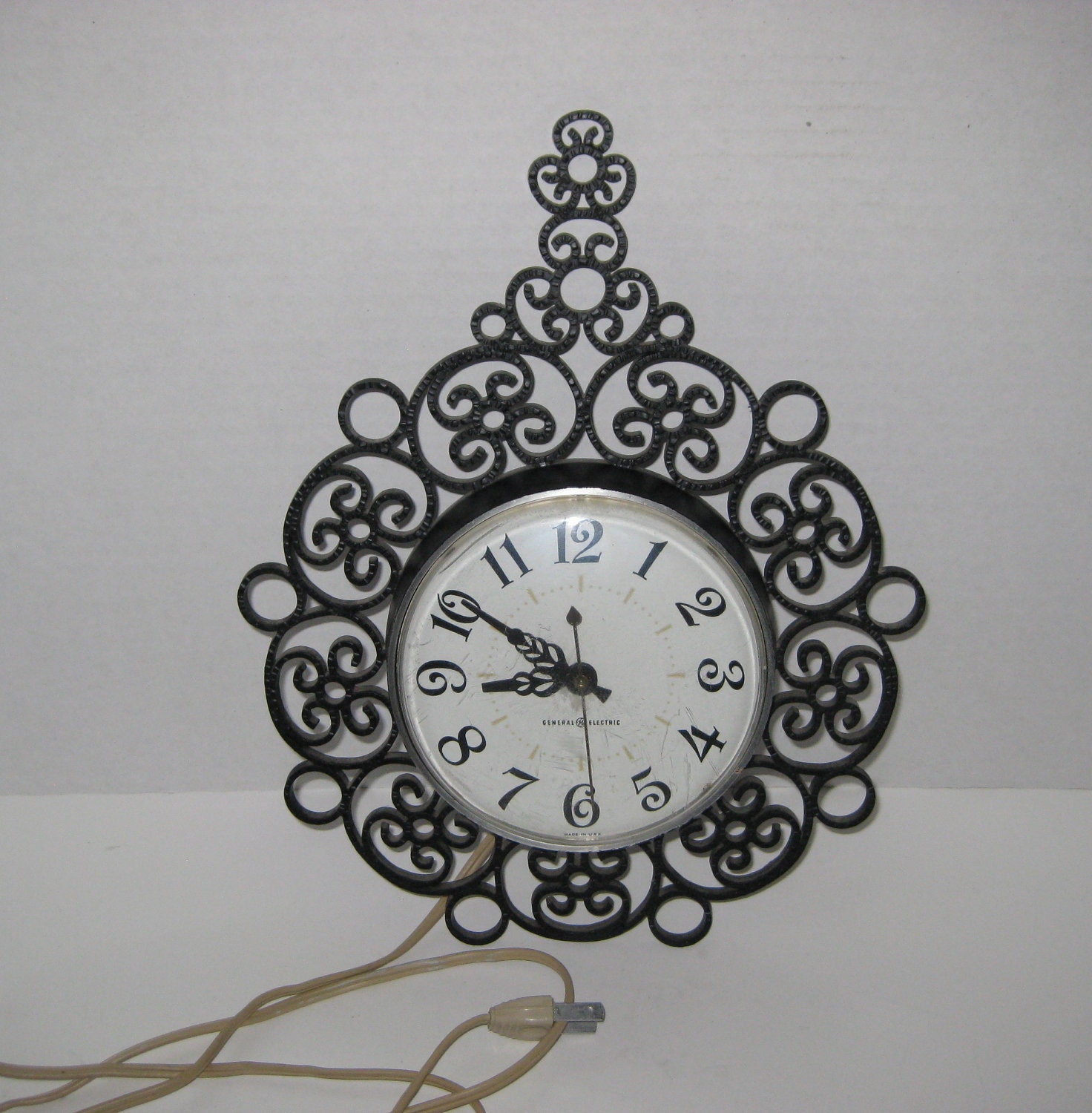 Vintage General Electric Black Filagree Scroll Electric Wall Clock