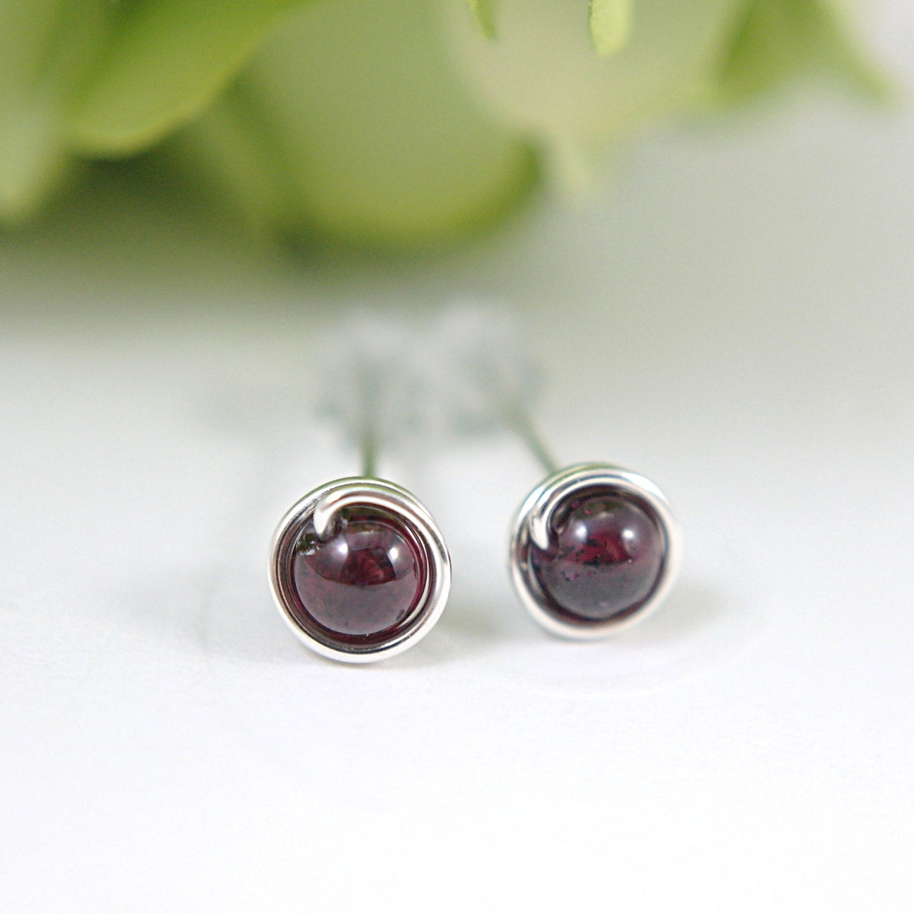 Tiny garnet gemstone post earrings sterling silver wire wrapped birthstone