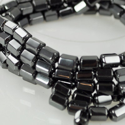 82 Magnetized Hematite Beads - Octagon Shaped Barrel
