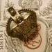 Antique Brass 1922 Crown Badge