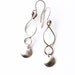 Matte silver earrings in a simple contemporary jewelry design perfect and lightweight for everyday wear - "Swirls and Flourish Earrings"