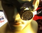Steampunk monocle or monogoggle with filigree