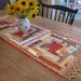 quilted folk table runner in log cabin patchwork from treasured scraps with hand crochet edge