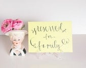 yellow calligraphy reserved sign // five by seven