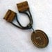 Orange Bakelite and Rhinestone Mesh Art Deco Cloak Clasp