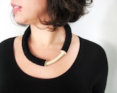 black minimal bold geometric tube necklace with an ivory curve - pergamondo