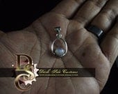 ELLIPTICAL ORBIT Sterling and Moonstone Pendant