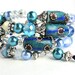 ICE TEAL TWISTER Bracelet- Featuring Handmade African Krobo Trade Beads, Moonstone and Silver
