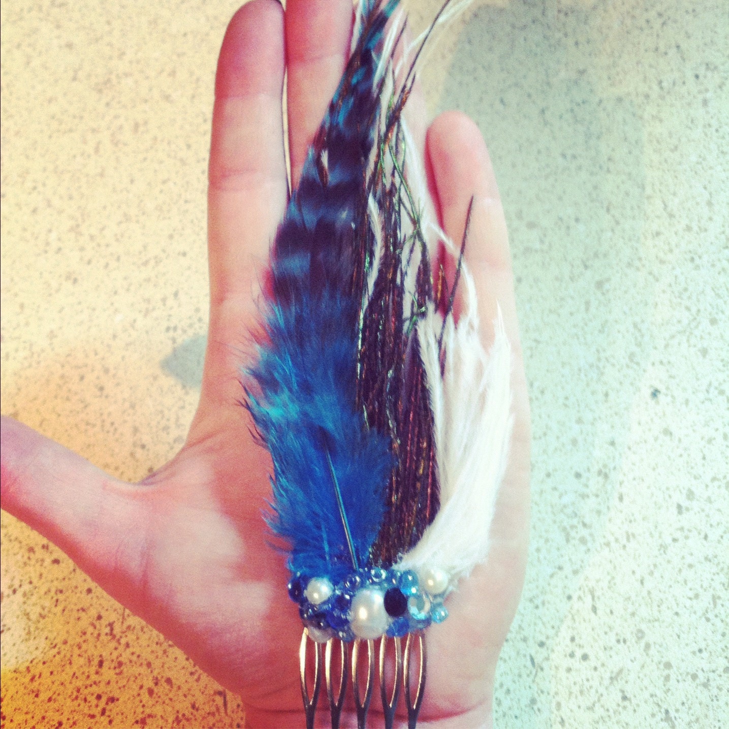 Lovely feather and jewel hair comb
