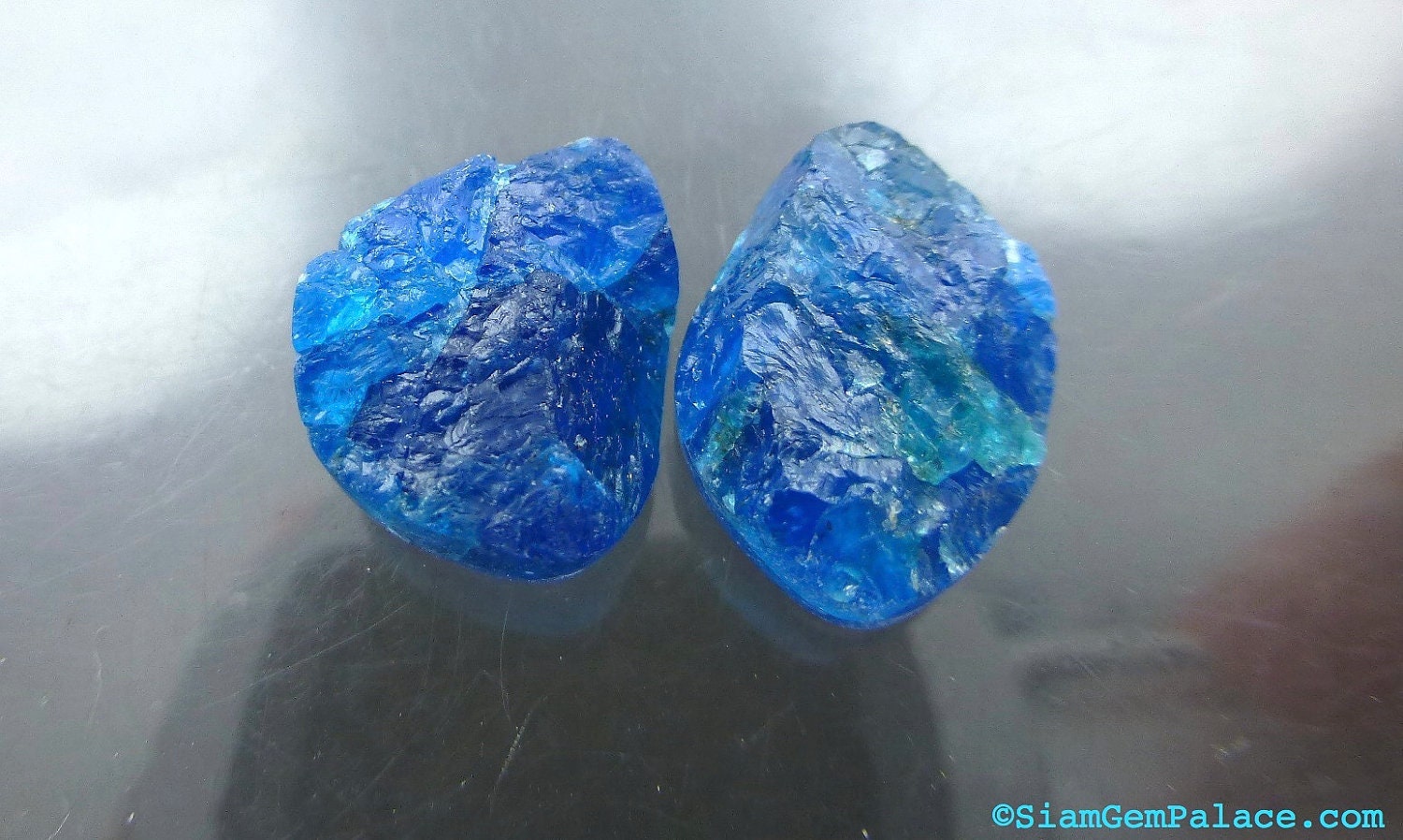 APATITE COOKiES. NeOn BLUE. Rough Top Natural Surface. Free Form Shapes. 2 pc. 13.45 cts. 9x12 and 9x14mm (AP341)