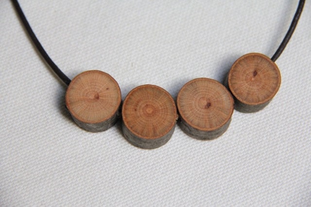 beech button necklace on a leather cord