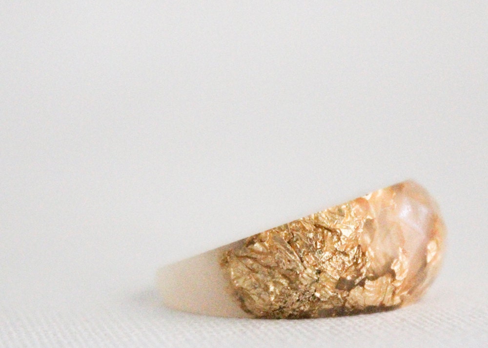 rose and gold multifaceted eco resin ring with suspended gold flakes