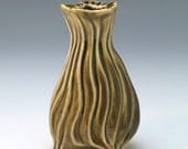 Carved olive celadon porcelain bud vase
