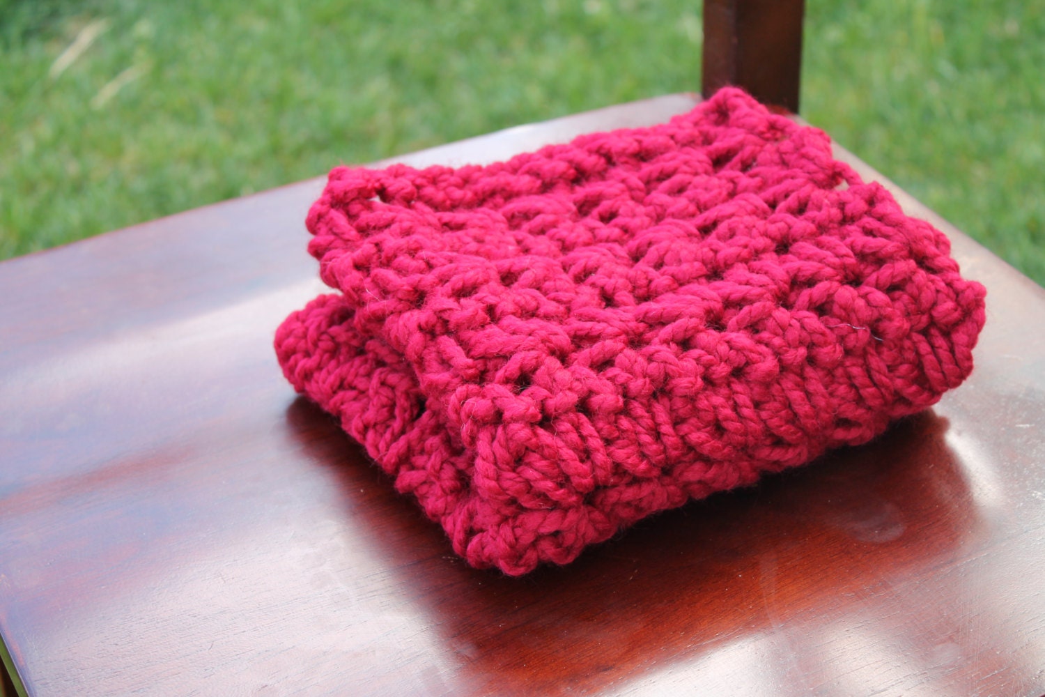 newborn mini blanket in cranberry. chunky crochet baby photography prop