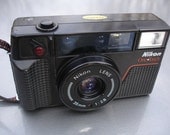 Vintage Nikon One Touch 35mm Film Camera - We specialize in vintage cameras for you