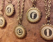 initial pendant. gold & black. free shipping.