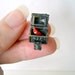 Tiny micro gnome in a trunk pendant - with tiny key charm