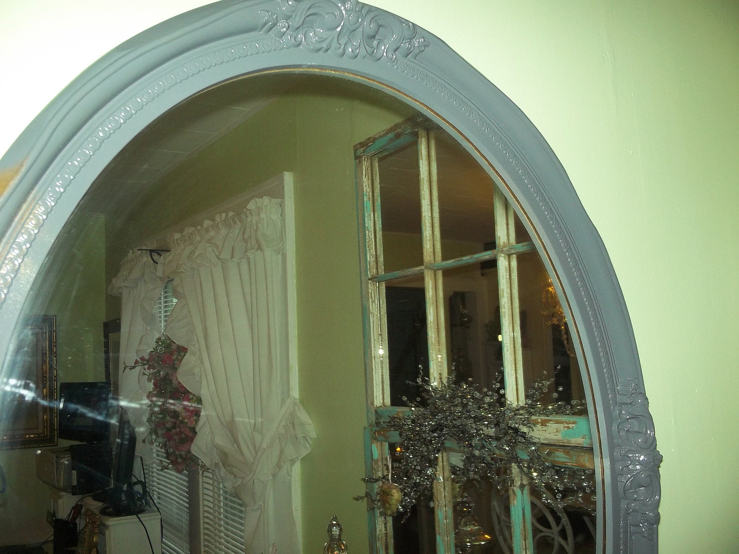 Lots of mirror with this oval gray Hollywood Regency, French cottage, Victorian baroque mirror