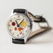 Vintage wrist watch, mechanical watch, boy playing football, USSR