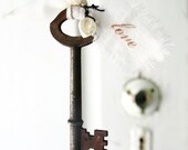 key to my heart . boutonniere . key with love tag and petal pearl . unspoken promises . for a cottage chic wedding