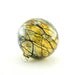 Hand Blown Art Glass Ornament - Iridescent Gold Amber with Black Stripes