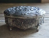 Vintage Trinket Box - Metal box with cherub design.
