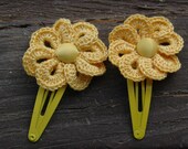 Set of two crocheted flower barrettes Yellow color