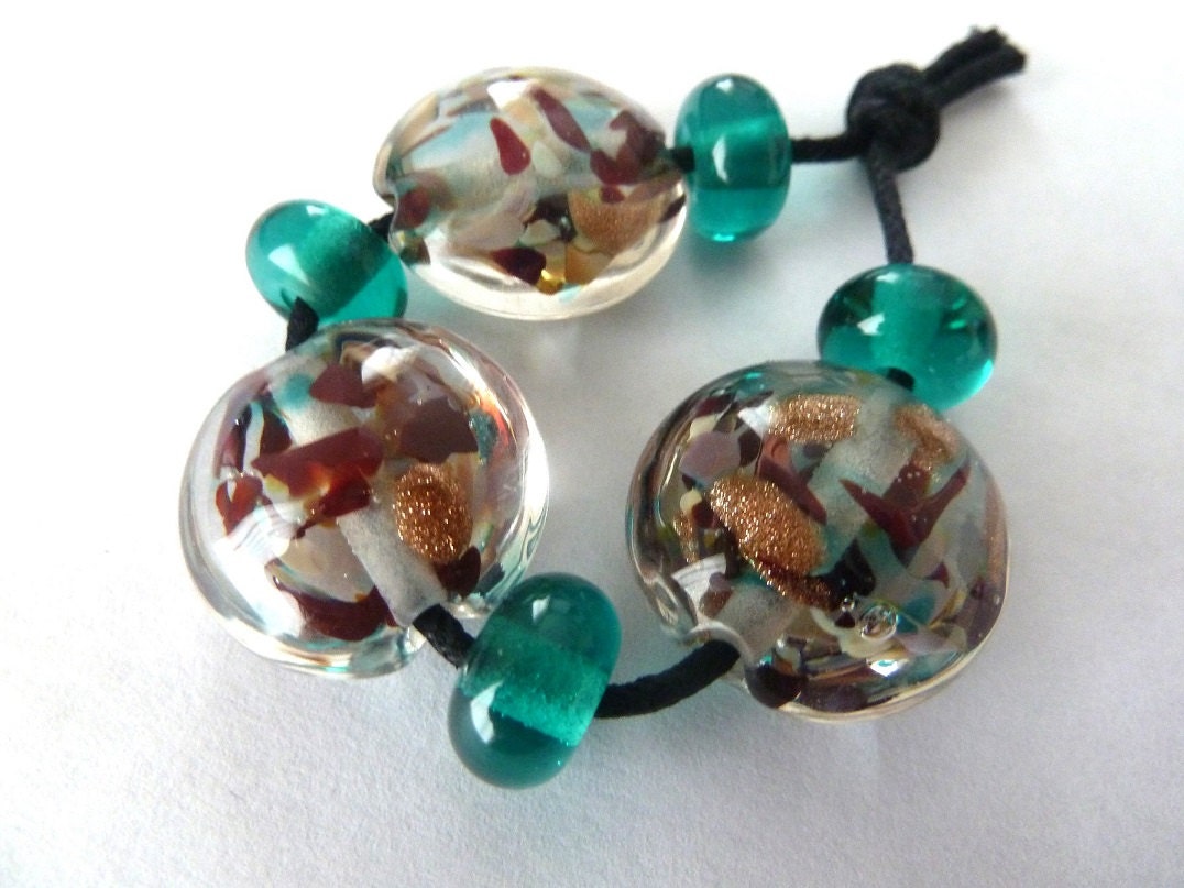 handmade lampwork glass beads, teal and goldstone set