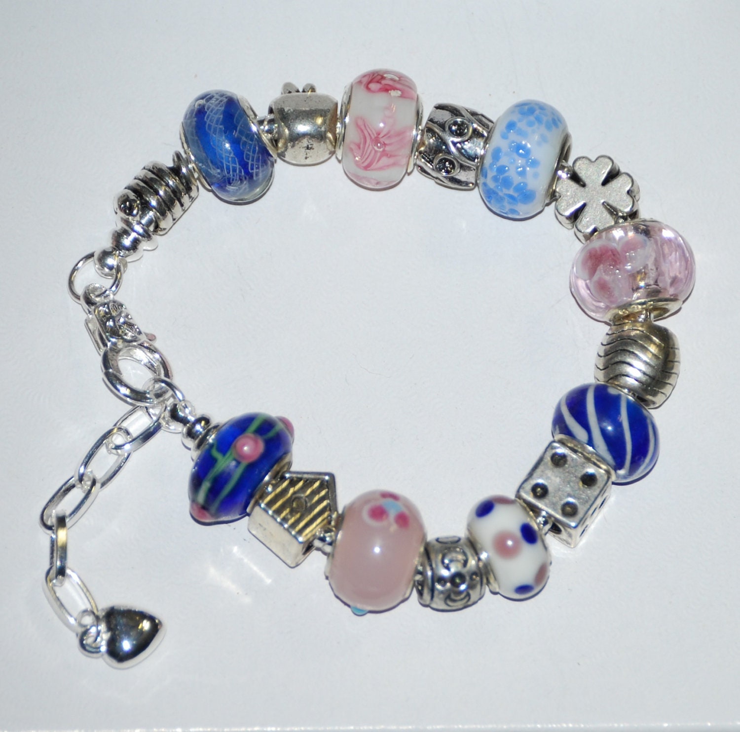 Lovely Pandora like European bracelet with pink and blue Murano beads plus adorable silver spacer charms.