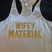 WIFEY MATERIAL Racerback Tank