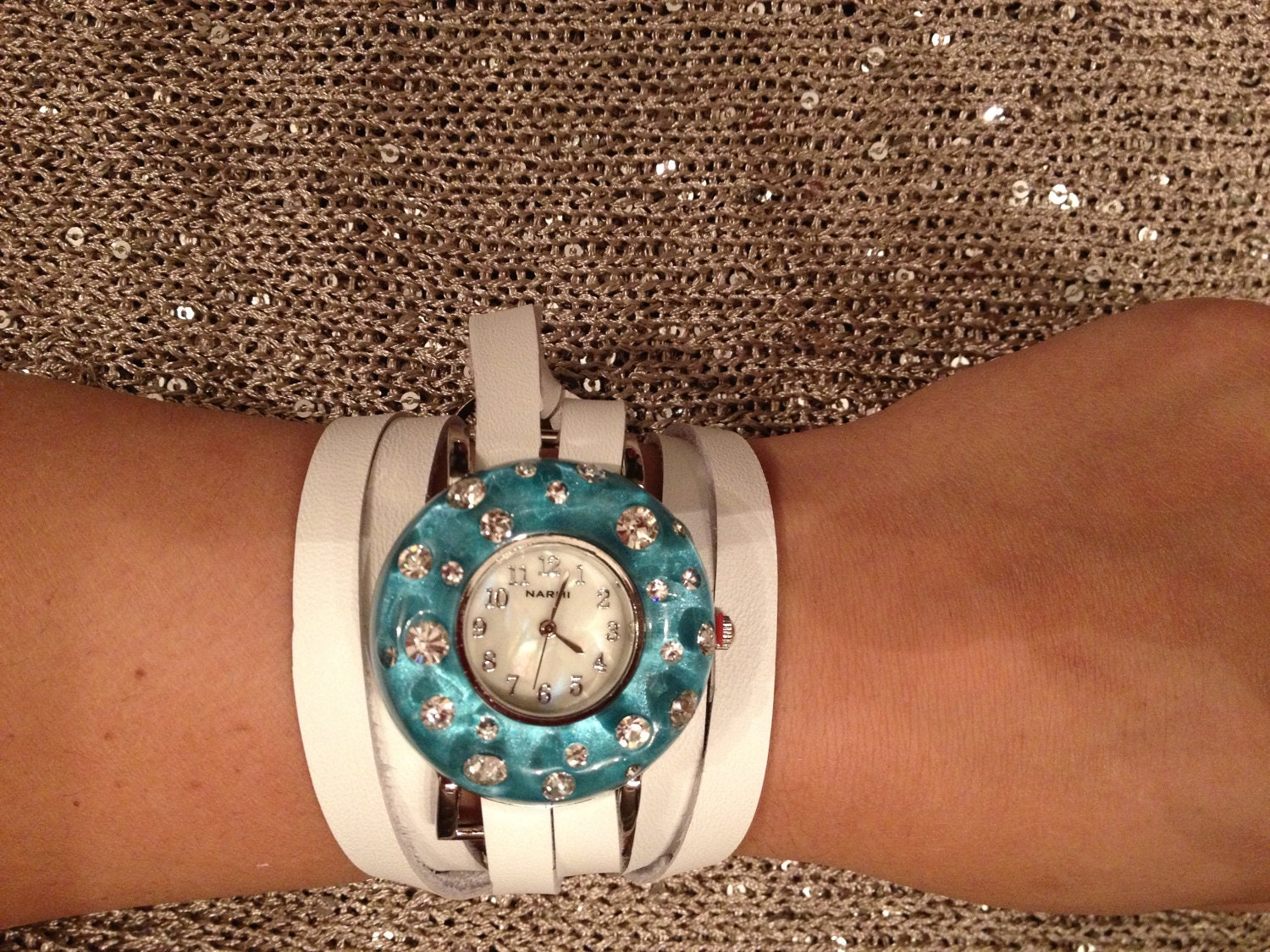 leather wrap watch with turquoise watch face
