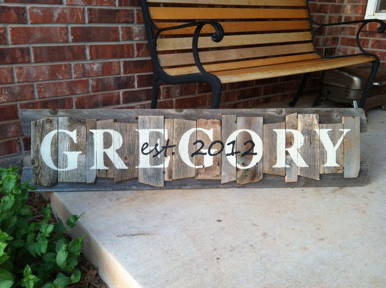 Personalized Family Name Sign on a rustic random wood canvas