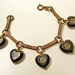 Victorian Edwardian Black Brass Enamel Heart Flower Charm Bracelet