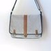 Blue and white striped canvas messenger bag, adjustable strap