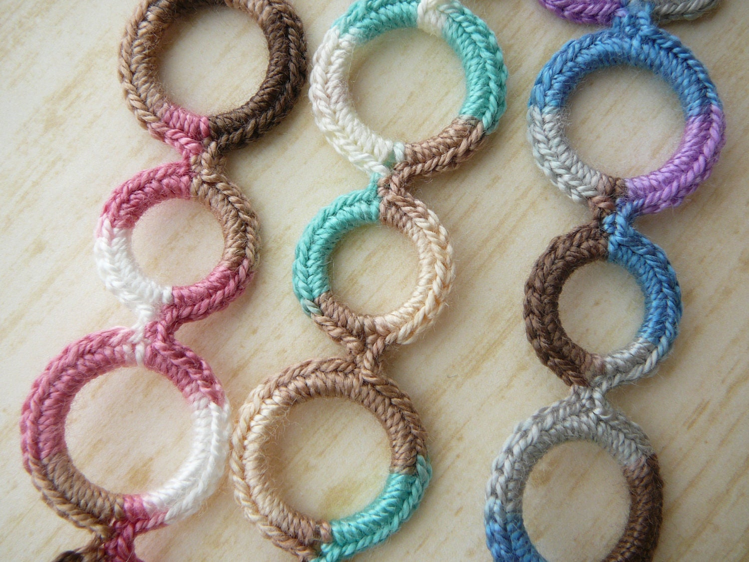 Baby pacifier clip, crochet, circles- Newest style - (universal, fits mam, soothie, nuk)  Made by lippy brand.