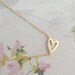 sideway heart necklace in Gold / Silver