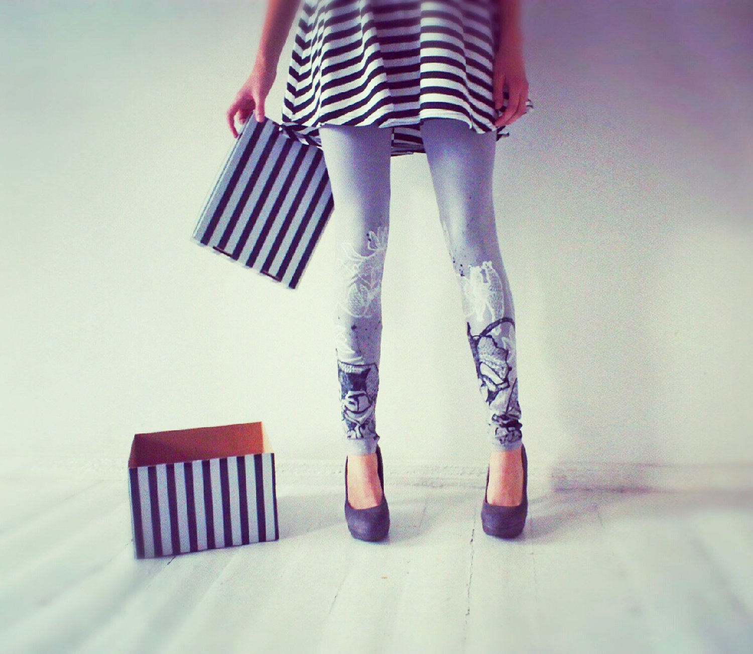 Black and white games-  grey leggings with graphic animal print