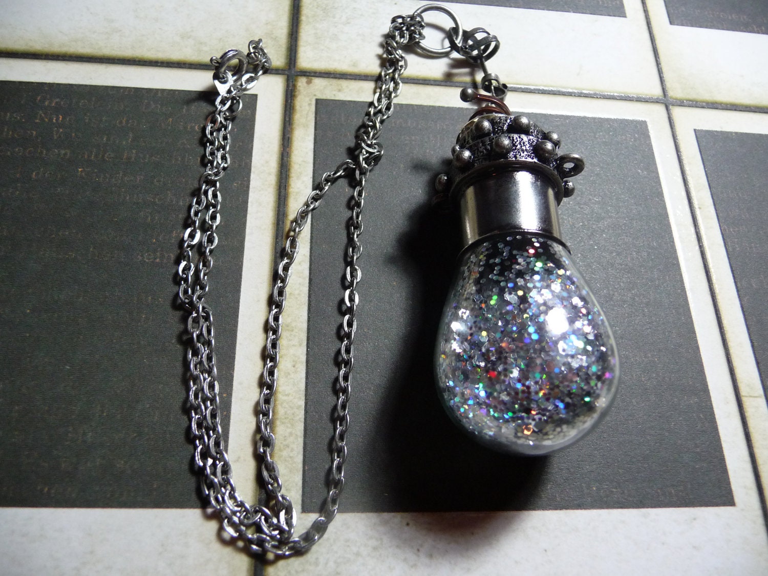 Vintage Light Bulb Filled with Silver Glitter Flakes necklace by vintagerust