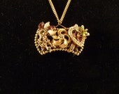 One of a kind metal work pendant necklace on a vintage Monet chain. Vintage jewelry recycled into a pendant necklace, handmade