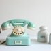 Aqua mint green vintage rotary telephone.