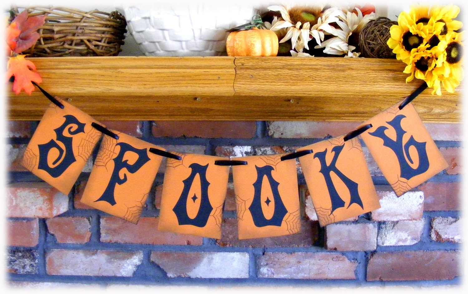 SPOOKY HALLOWEEN holiday banner in rustic orange and black with spider webs and 3D bats