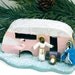 Pink vintage trailer with nativity scene