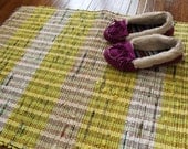 Yellow Upcycled Rug Woven from Plastic Grocery Bags.
