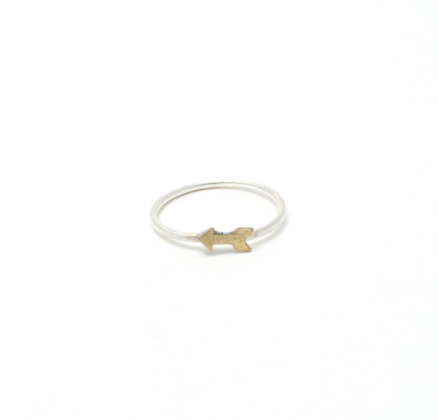 Summit -- sterling silver ring with brass arrow