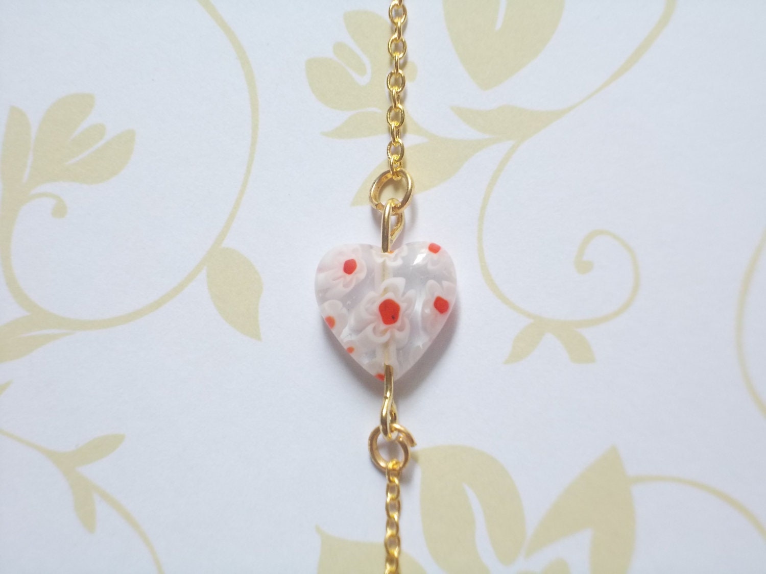 Heart red millefiori glass bracelet. Gold metal chain. Beaded bracelet.