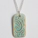 Porcelain Ceramic Pendant Necklace with Stamped Design in Yellow and Green Glaze OOAK